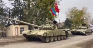 Azerbaijani tank entering conquered lands