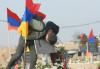 Brother's sorrow at an Armenian Cemetery